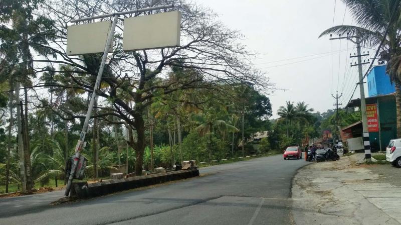 Damaged lamp post at bypass junction poses threat to the commuters.