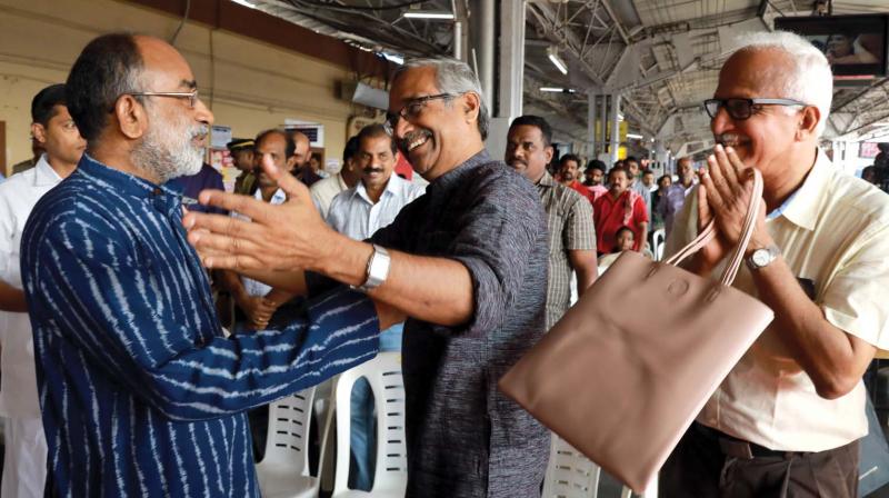 Union Minister of State for Tourism Alphons Kannamthanam interacts with passengers during the launch of book titled New railways, New Kerala at South railway station in Kochi on Wednesday.  (ARUN CHADRABOSE)