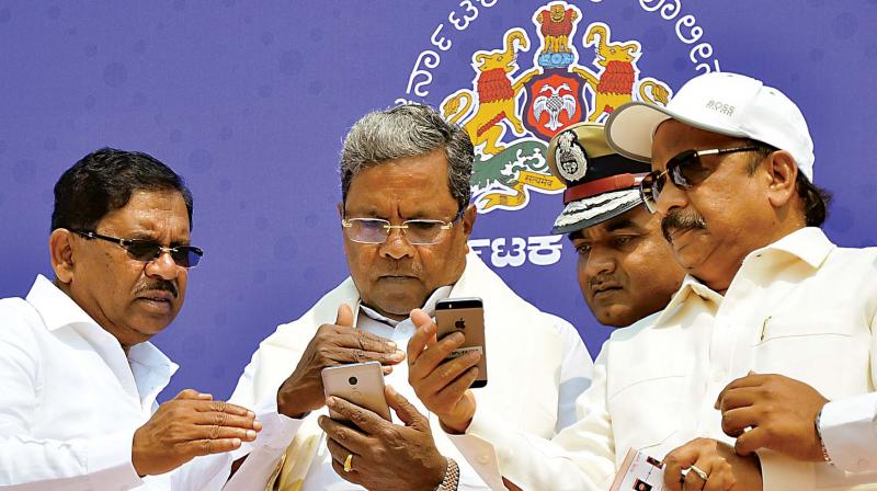 Chief Minister Siddaramaiah launches the Suraksha, app for women and children, in Bengaluru on Monday