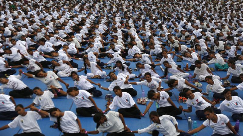 Majority of people are ready to shell out money from Rs 5,000 month to Rs. 25,000 a month for yoga classes (Photo: AFP)