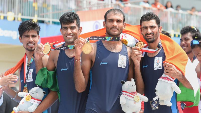 The team comprising Sawarn Singh, Dattu Bhokanal, Om Prakash and Sukhmeet Singh clocked 6:17.13 to win the gold medal in mens quadruple sculls. (Photo: PTI)
