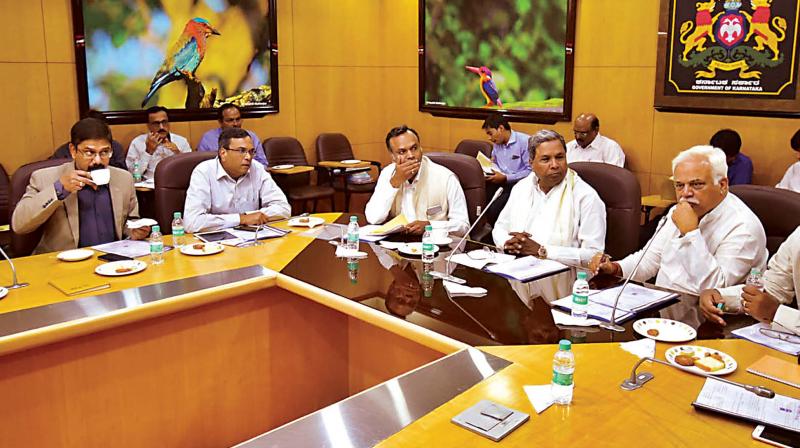 CM Siddaramaiah at  a high level clearance committee meeting in Bengaluru on Monday. (Photo: DC)