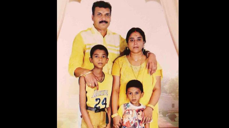 Sinoj, his wife Nisha, and children Surya Thejas and Surya Govind who were found dead inside their house at Marangattupally.