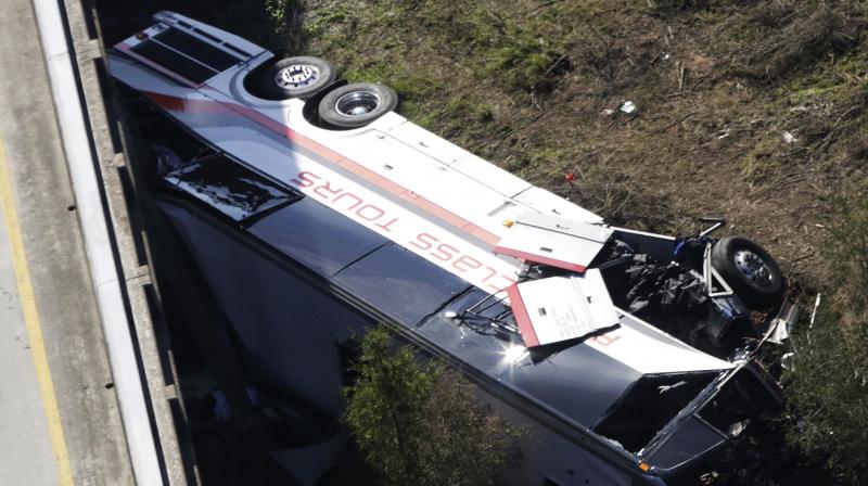 The cause of the crash wasnt immediately known, but survivors from Channelview High School in metro Houston described being asleep one moment and tumbling through the air the next. (Photo: AP)