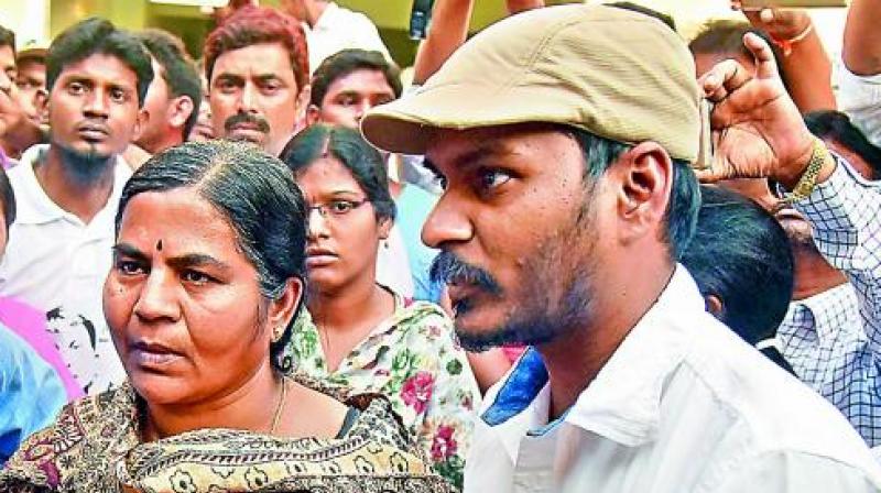 Rohit Vemulas mother Radhika Vemula and brother Raja Vemula. (Photo: DC/File)