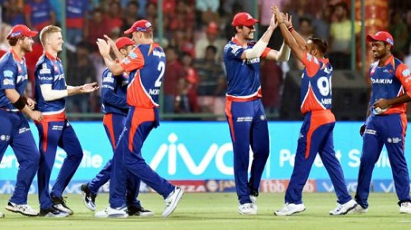 Delhi Daredevils players celebrate after dismissal of G Maxwell of KXIP during an IPL match between Delhi Daredevils and Kings XI Punjab at Ferozshah Kotla in New Delhi on Saturday. (Photo: PTI)