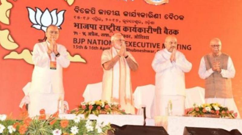Inance Ministr Arun Jaitley, PM Narendra Modi, BJP president Amit Shah and veteran leader LK Advani on the stage at the party national executive meet. (Photo: Twitter)