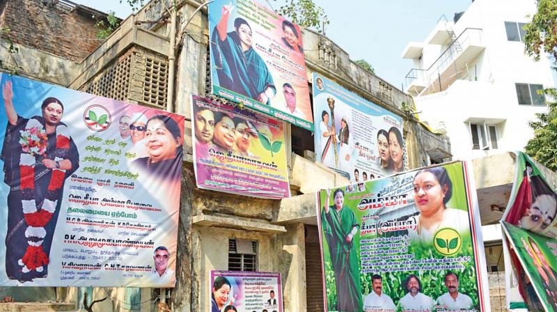 The posters and hoardings at the wall space outside Deepas TNagar house. (Photo: DC)