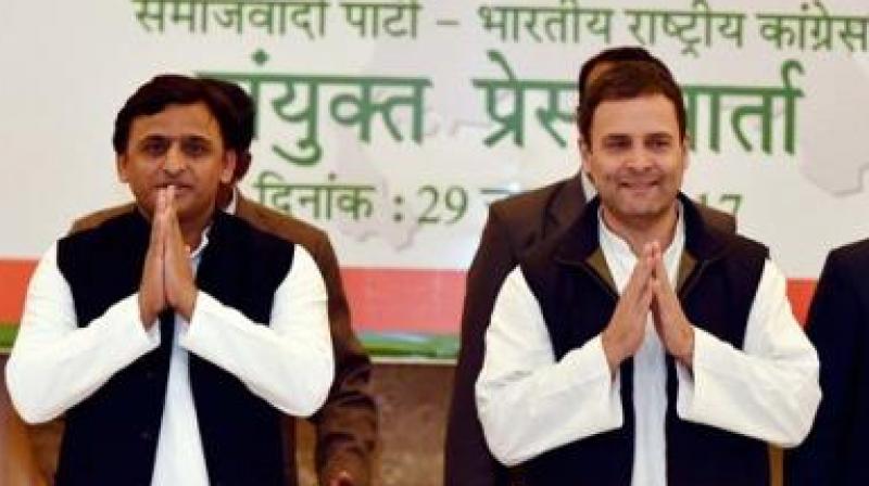 Akhilesh Yadav and Rahul Gandhi. (Photo: PTI)