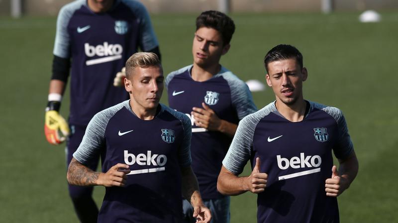 Barca spokesman Josep Vives said the womens team flew in economy rather than business because they were a late addition to the tour and they had already contracted a charter flight. (Photo: AP)