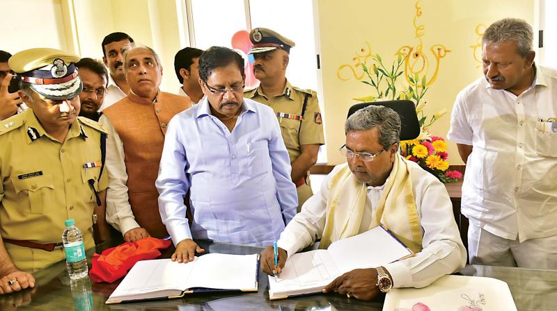 Chief Minister Siddaramaiah with Home Minister Dr. G Parameshwar,Union Minister D.V.Sadananda Gowda and MLA Arvind Limbavali at the newly-constructed police station at Whitefield, in Bengaluru on Thursday.