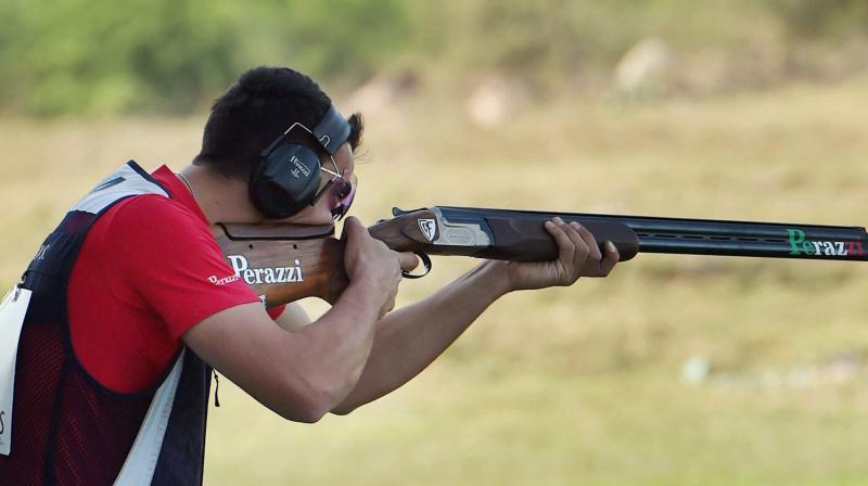 D Ambrosio Simone of Itali wins the gold in final trap Mens in International Shooting Sport Federation (ISSF) at the Dr. Karni Singh Shooting Ranges during Day 2 of the ISSF World Cup Rifle/Pistol/Shotgun in New Delhi on Saturday. (Photo: AP)