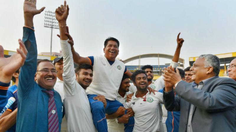 Chandrakant Pandit (center) as coach, has won the title thrice, reached the final four times. (Photo: PTI)