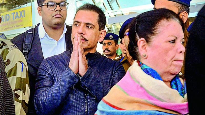 Robert Vadra with his mother arrives to appear before the ED officials in Jaipur.