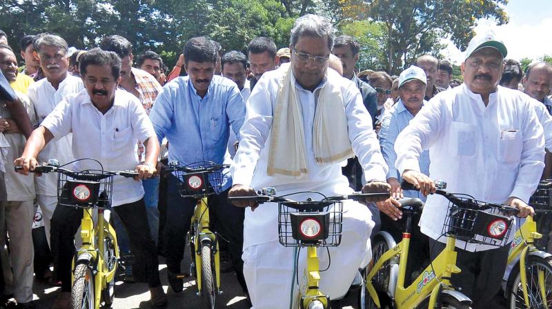 Chief Minister Siddaramaiah inaugurates countrys first ever Public Bicycle Sharing System in Mysuru on Sunday. (Photo: KPN)