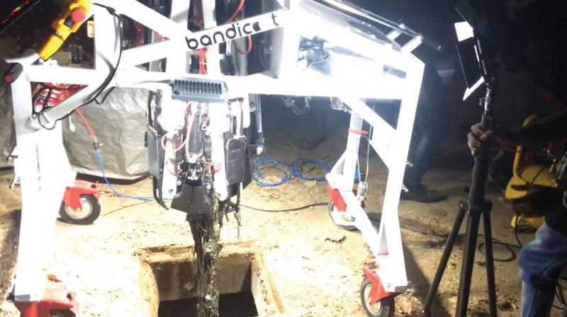 A trial run of the Bandicoot robot in progress at Thiruvananthapuram.