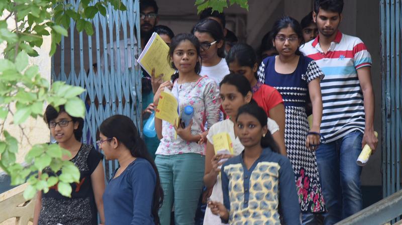 IIT aspirants come out of the examination hall after writing their JEE (Advance) at Tarnaka. (Photo: DC)