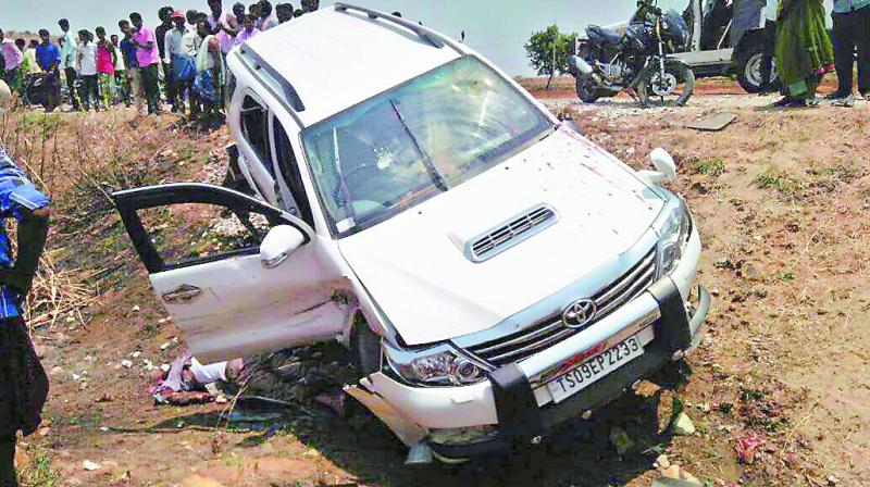 People gather at the spot where YSRC leader Lakshmi Narayana Reddy was murdered on Sunday.(Photo: DC)