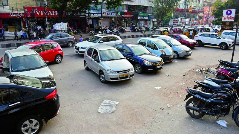Car parked at free parking space on SD Road in Secunderabad.