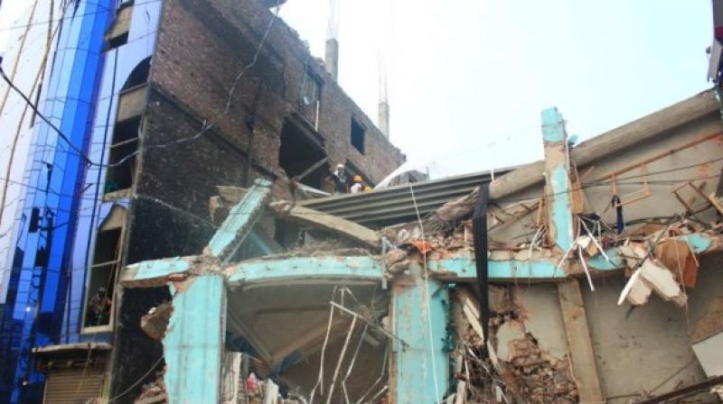 The building collapsed during the wee hours of Tuesday. (Photo: ANI/Twitter)