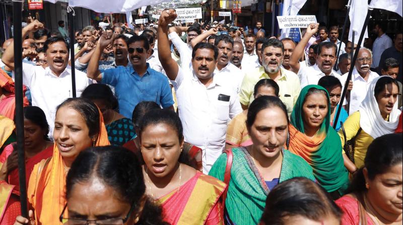 Members of Kerala Vyapara Vyavasa Ekopana Samiti take out a march in Kochi on Saturday protesting against attacks on shops and business establishments during hartals. (Photo: Arun Chandrabose)