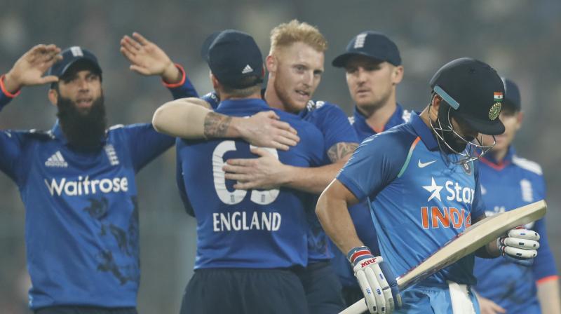 Ben Stokes starred with bat and ball, scoring 57 off 39 balls and scalping three wickets, as England beat India by 5 runs at the Eden Gardens. (Photo: AP)