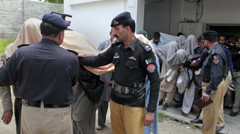 The arrests followed intermittent clashes since the weekend between Khans supporters and riot police in the capital that saw police using tear gas and batons to fight stone-throwing activists. (Photo: AP)