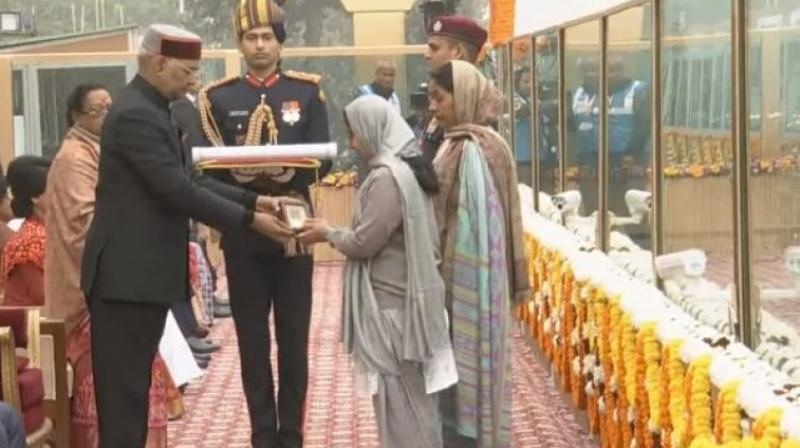 The award was received by Corporal Niralas wife Sushmanand and his mother Malti Devi at the majestic Rajpath during the 69th Republic Day. (Photo: ANI)