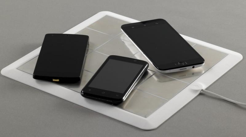 Unlike other chargers that use electromagnetic induction, Energysquare has developed a new tech that depends on electric conduction. This also allows multiple devices to charge at once.