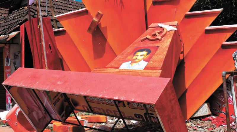 A memorial of CPM leader Azhikodan Raghavan was damaged by the protesters in Thrissur on Thursday.
