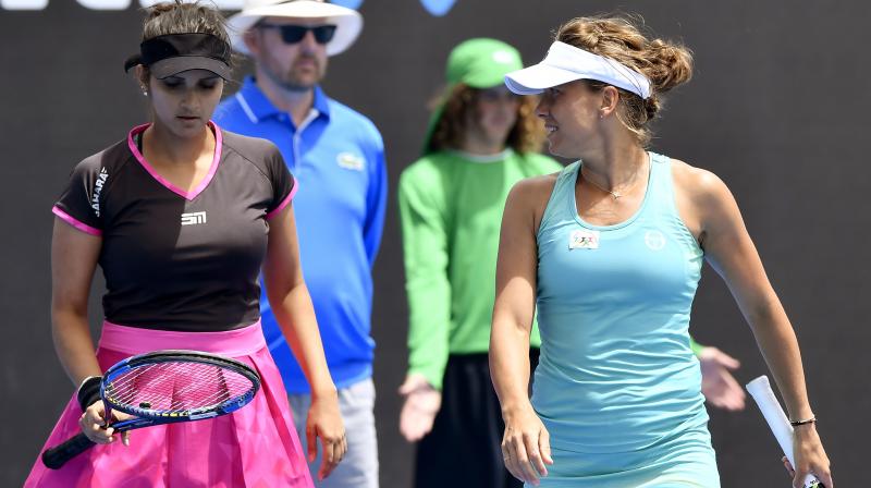 Sania was in for disappointment as the Indian, partnering Barbora Strycova of Czech Republic, lost to Japanese E Hozumi and M Kato 3-6 6-2 2-6. (Photo: AP)