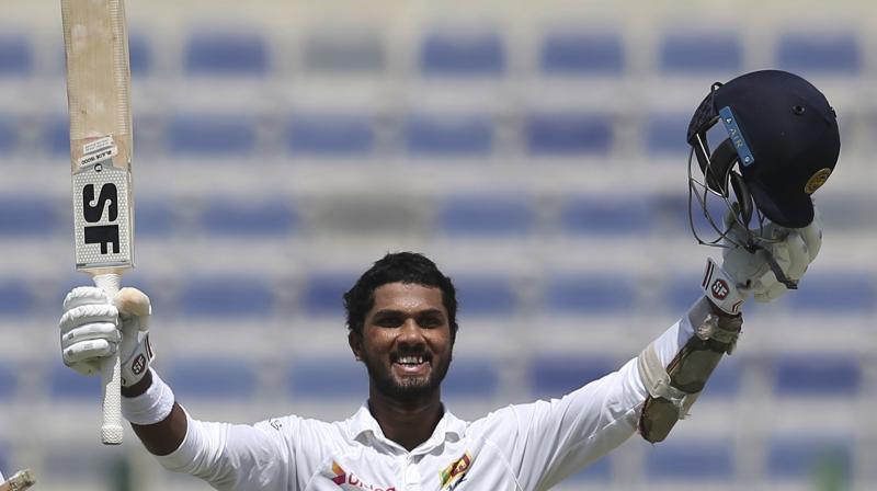 Dinesh Chandimal reached his ninth Test century -- his first in four Tests as captain, and first against Pakistan -- by driving fast bowler Mohammad Amir through the covers for his 11th boundary.(Photo: AP)