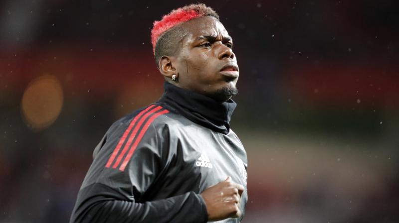 Paul Pogba is facing a long spell on the sidelines due to a hamstring injury, manager Jose Mourinho said on Friday.(Photo: AP)