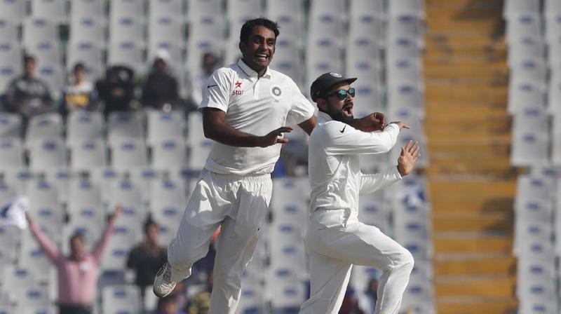 Jayant Yadav dismissed Joe Root and Jonny Bairstow, two key England batsmen, on day one of the third Test in Mohali. (Photo: AP)