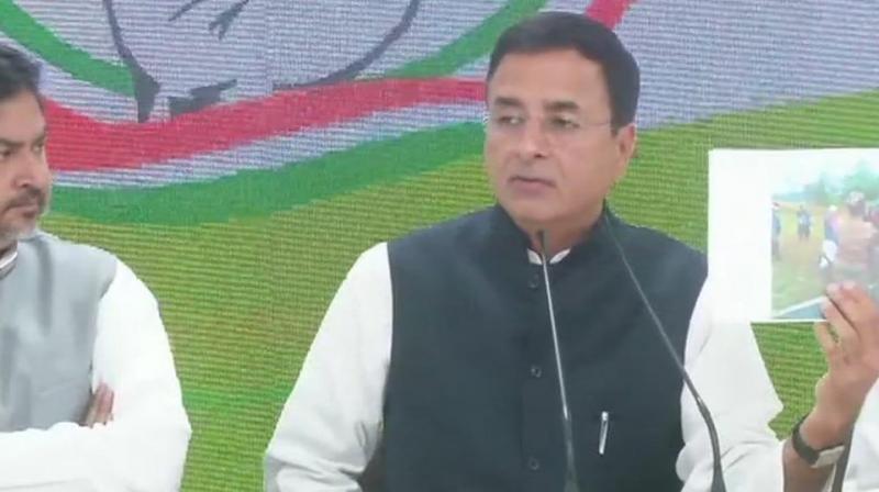 Congress spokesperson Randeep Surjewala, addressing a press conference, launched an all-out attack on the government and the prime minister over the Pulwama terror strike. (Photo: ANI | Twitter)