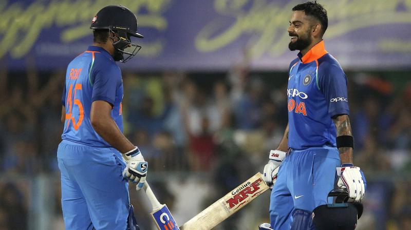 Captain Virat Kohli (140) and Rohit Sharma (152) led from the front as hosts India comfortably beat West Indies by eight wickets in the first ODI on Sunday. (Photo: AP)