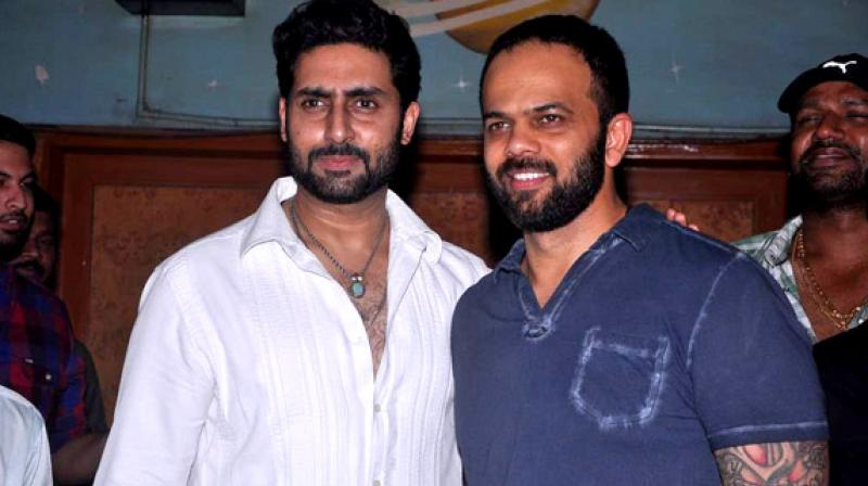 Abhishek Bachchan and Rohit Shetty at an event.