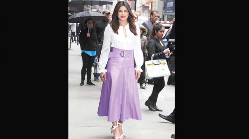 Priyanka Chopra sports a trendy mauve skirt.