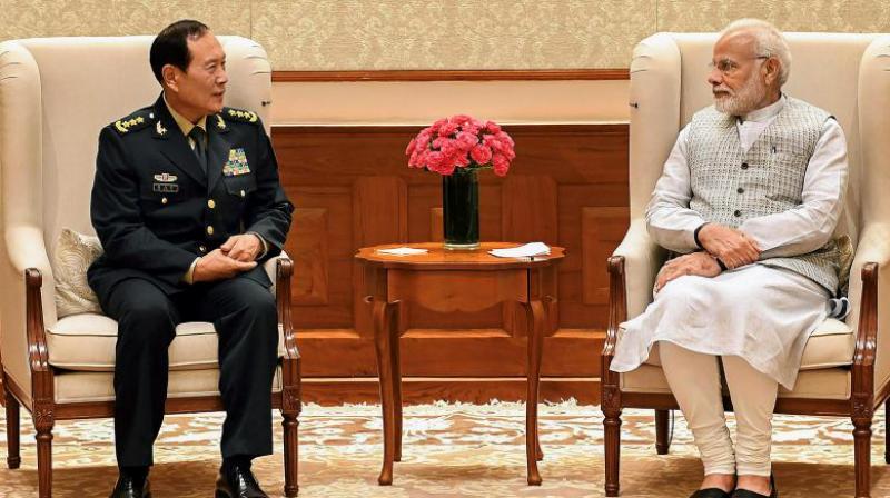 Prime Minister Narendra Modi and Defence Minister of China, General Wei Fenghe during a meeting in New Delhi on Tuesday, August 21, 2018. (Photo: PTI)