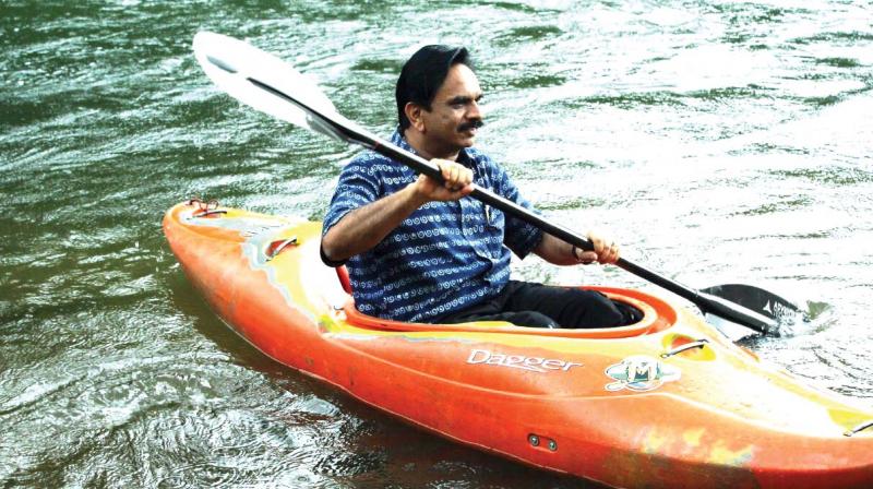 Kozhikode district collector U.V. Jose kayaking at Thusharagiri. (Photo: DC)