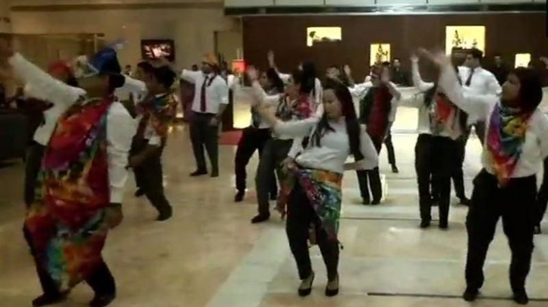 In the video, the staffers also urged people to join in the celebrations. (Photo: ANI/Twitter)