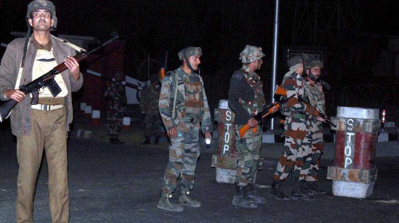 Security personnel after an encounter with millitants at Army camp in Nagrota area of Jammu. (Photo: PTI)