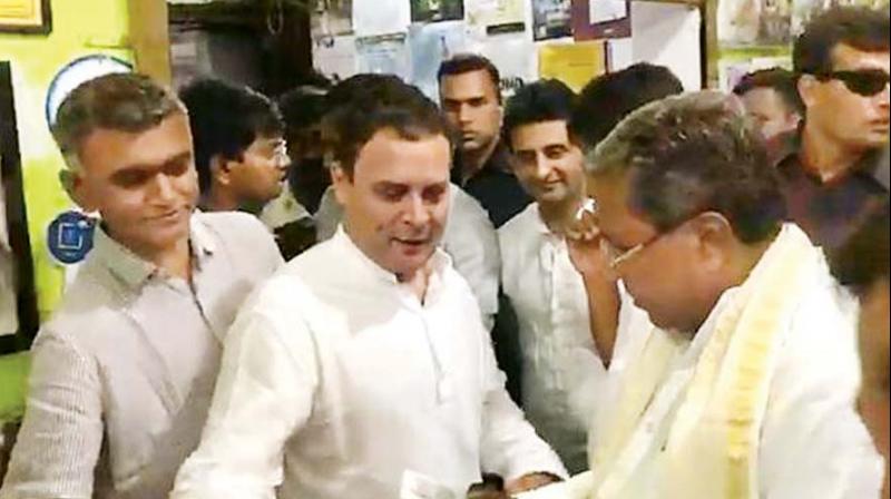 A file photo of Congress president Rahul Gandhi with party leaders Siddaramaiah and Krishna Byregowda in Bengaluru.