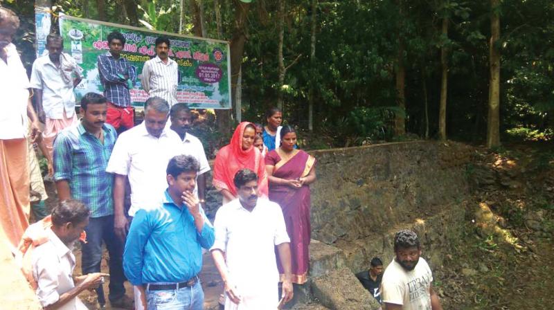 District Collector Muhammad Y. Safirulla takes stock of the pond cleaning drive.