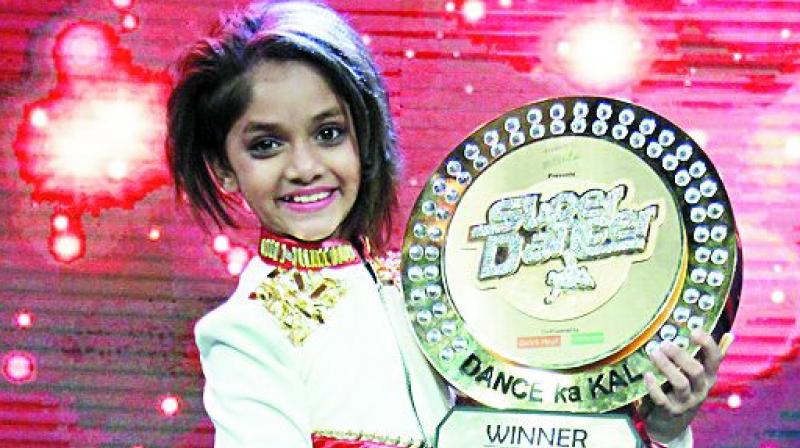 Ditya Sagar Bhande with her winning trophy.