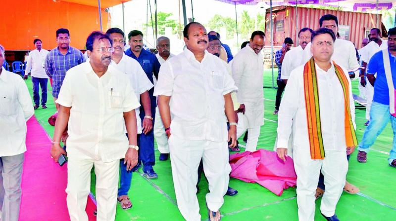 BJP state president Kannalakshmi Narayana inspects the arrangements for party national president Amit Shahs meeting to be held on Thursday in Rajahmundry on Wednesday. (Photo: DC)