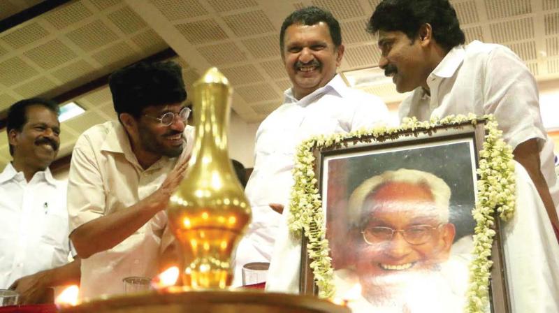 Congress leader K. Muraleedharan, MLA, sharing a light moment with IUML leader M.P. Abdussamad Samadani and DCC president T. Siddique during K Karunakaran commemoration programme organized by Leader Study Centre in Kozhikode on Monday.  (Photo: DC)