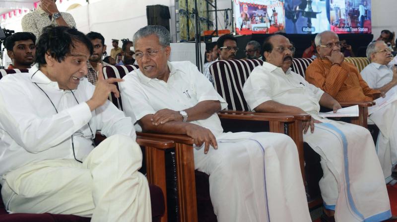 Union railway minister Suresh Prabhu and Chief Minister Pinarayi Vijayan talk during the inauguration of women facilitation center at the Thiruvananthapuram central railway station on Monday. Minister G Sudhakaran, O Rajagopal MLA , and CP Narayanan MP are also seen. 	(Photo: DC)