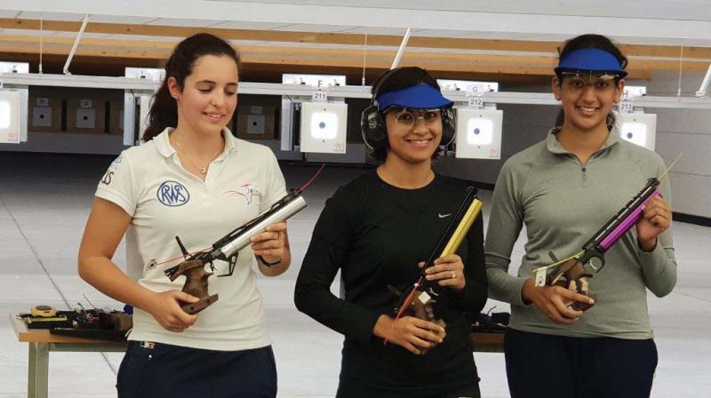 Heena Sidhu (centre) poses with runners-up Mathilde Lamolle (left) and P. Shri Nivetha.