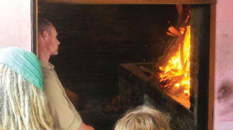 Partner of Latvian tourist Andrew Jordan during the cremation.